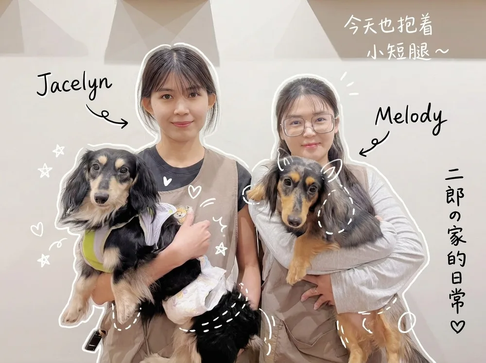 Jacelyn and Melody, each holding a dachshund, with hand-drawn doodles and notes